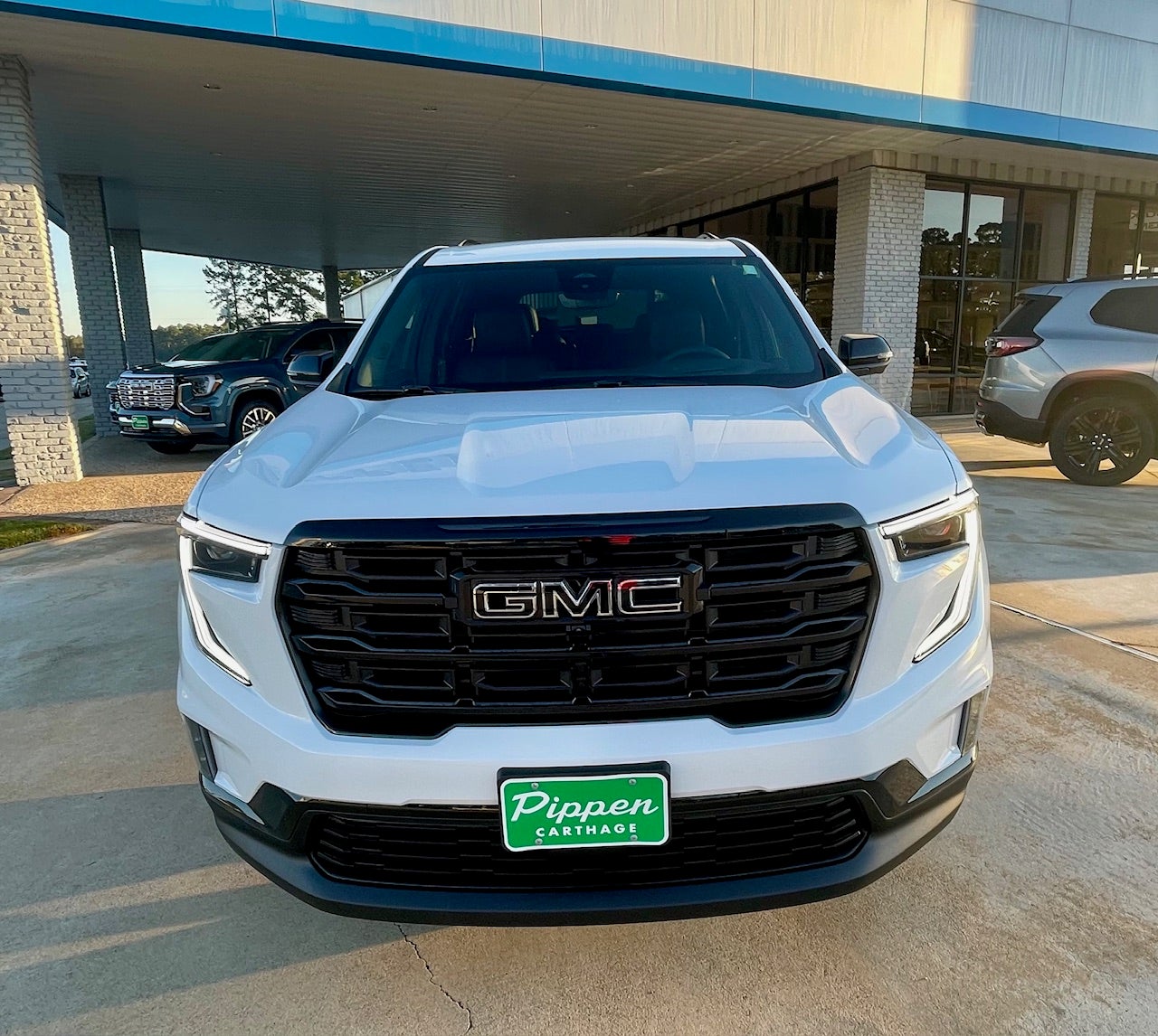 2026 GMC Acadia — rear three-quarter view