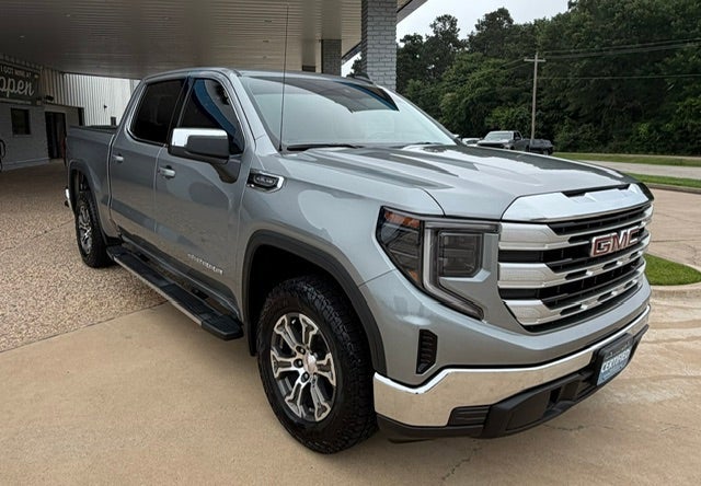 2023 GMC Sierra 1500 SLE in Sterling Metallic — front three-quarter view