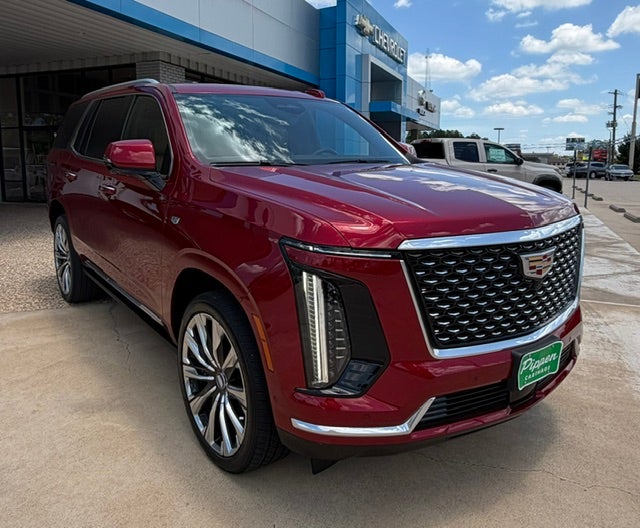 2025 Cadillac Escalade Premium Luxury in Radiant Red Tintcoat — front three-quarter view