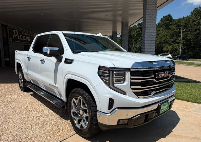 2026 GMC Sierra 1500 SLT in Glacier White Tricoat — front three-quarter view