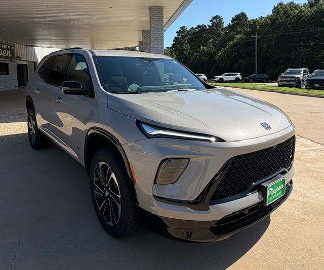 2026 Buick Enclave Sport Touring in Stone Metallic — front three-quarter view