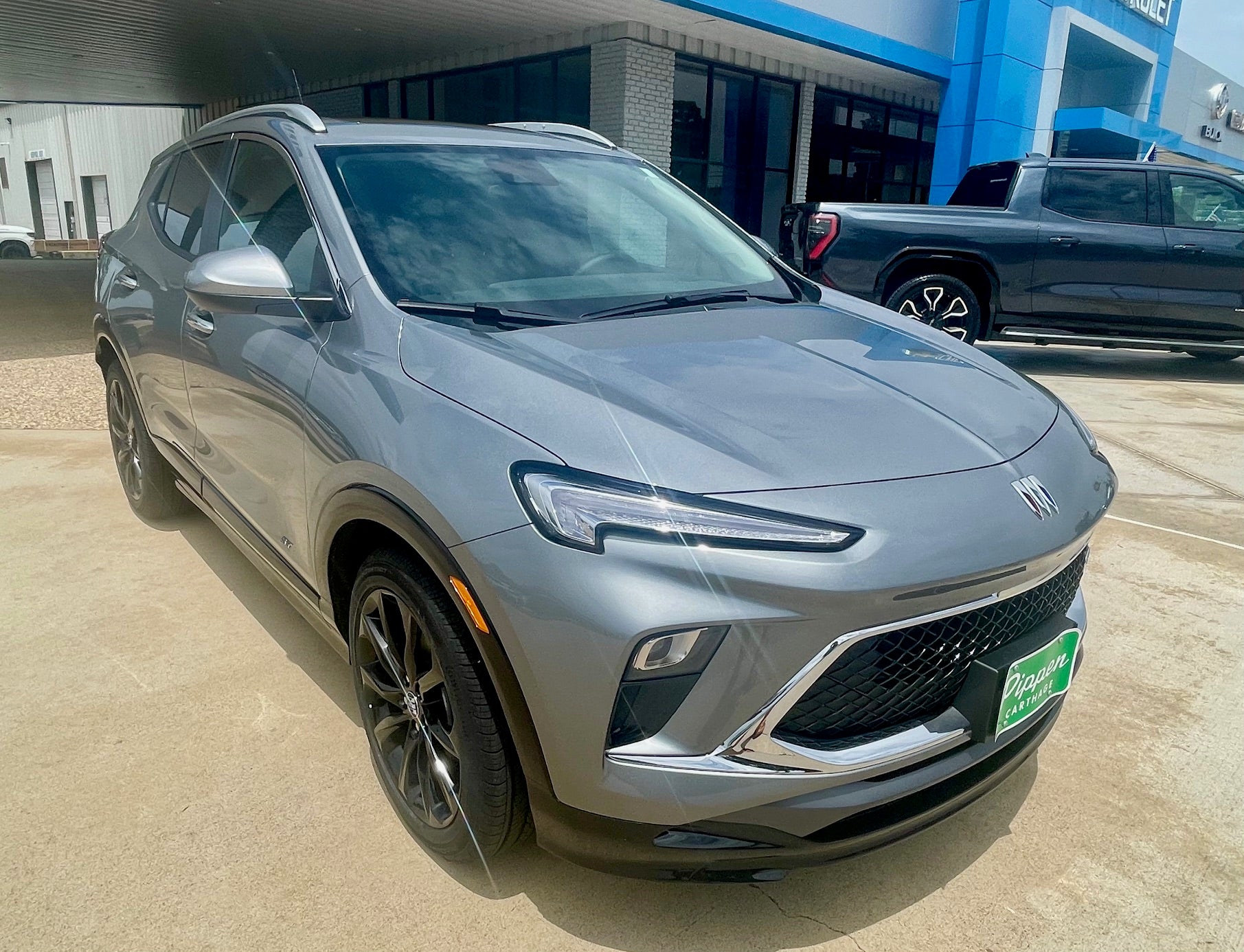 2026 Buick Encore GX Sport Touring in Moonstone Gray Metallic — front three-quarter view